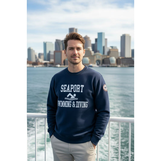 Man wearing swearshirt on cruise ship in boston harbor