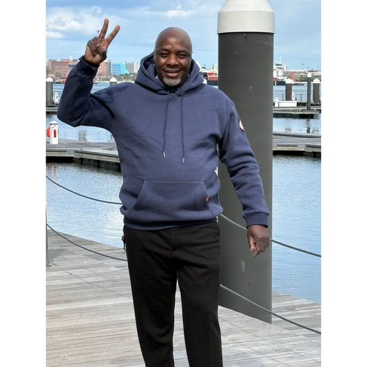 Man walking on harbor walk in Boston