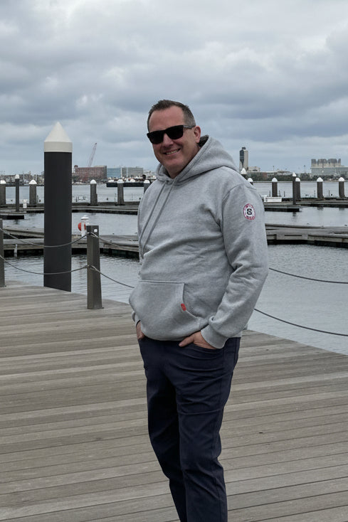 Man on Boston Harbor marina