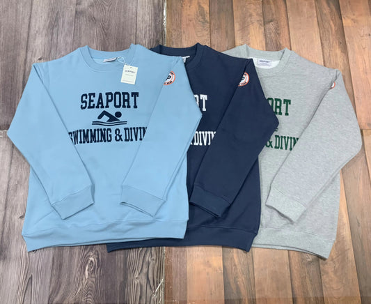 Three heavyweight sweatshirts layed flat on floor 
