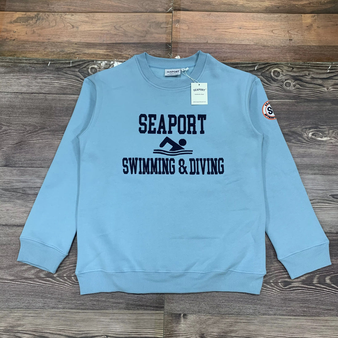 Blue sweatshirt with Seaport Swimming & Diving text