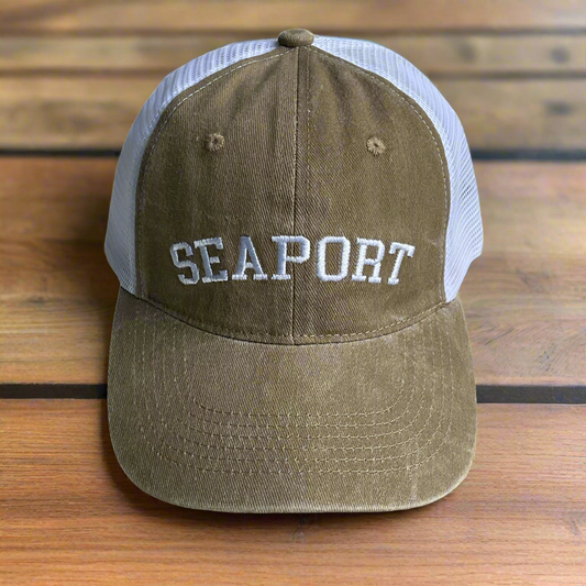 Dark tan hat with seaport logo and white mesh